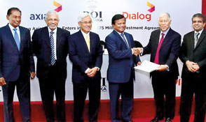 Dialog Axiata and BoI sign Rs.24.6bn investment agreement