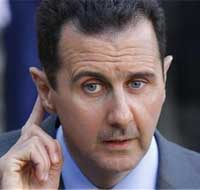 Assad says will live and die in Syria